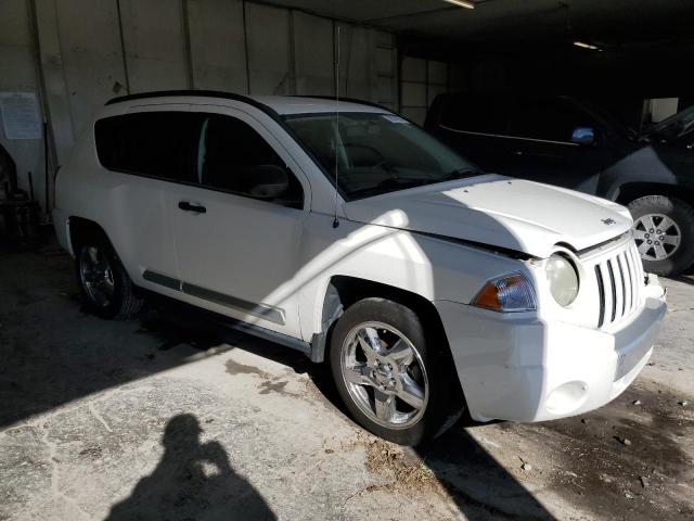 Photo 3 VIN: 1J4FT57B89D208634 - JEEP COMPASS 