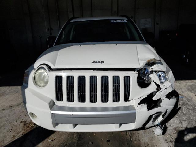 Photo 4 VIN: 1J4FT57B89D208634 - JEEP COMPASS 