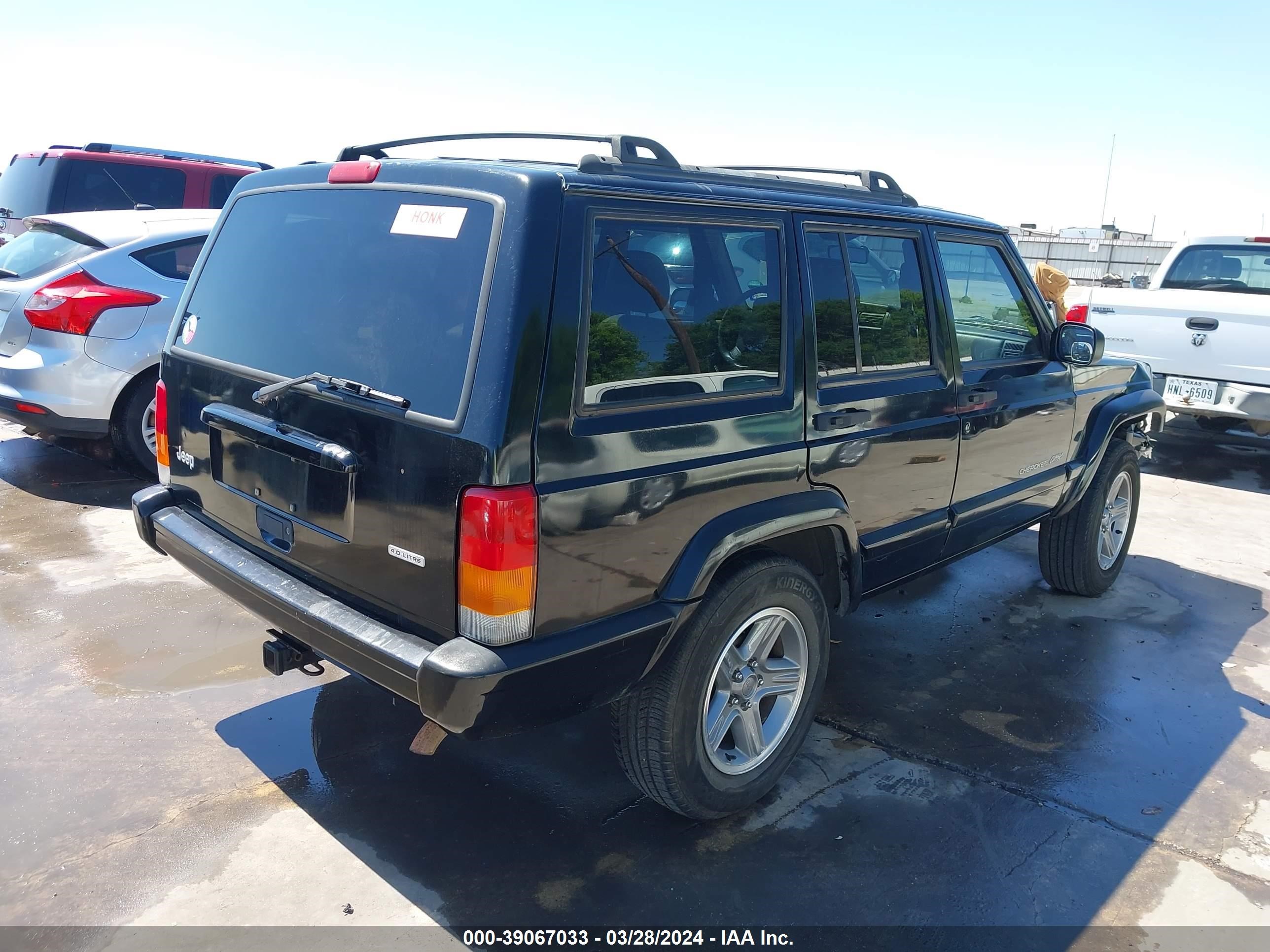 Photo 3 VIN: 1J4FT58S4YL238068 - JEEP CHEROKEE 