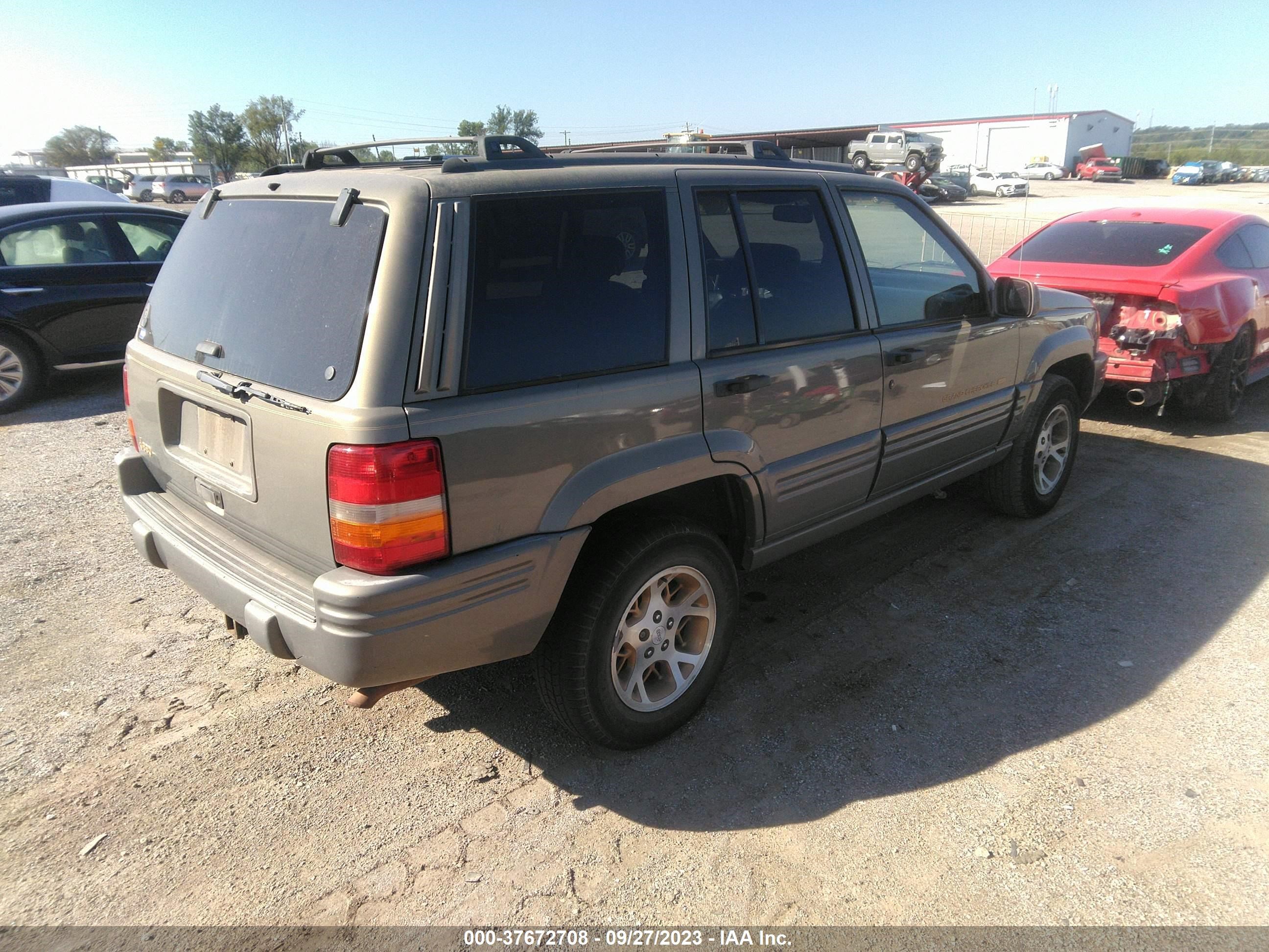 Photo 3 VIN: 1J4FX78SXVC761199 - JEEP GRAND CHEROKEE 