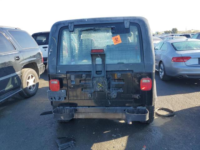 Photo 5 VIN: 1J4FY19P0SP248116 - JEEP WRANGLER 