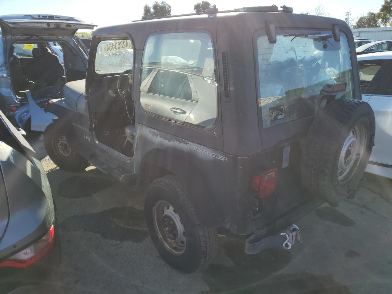 Photo 1 VIN: 1J4FY19P1RP427548 - JEEP WRANGLER 