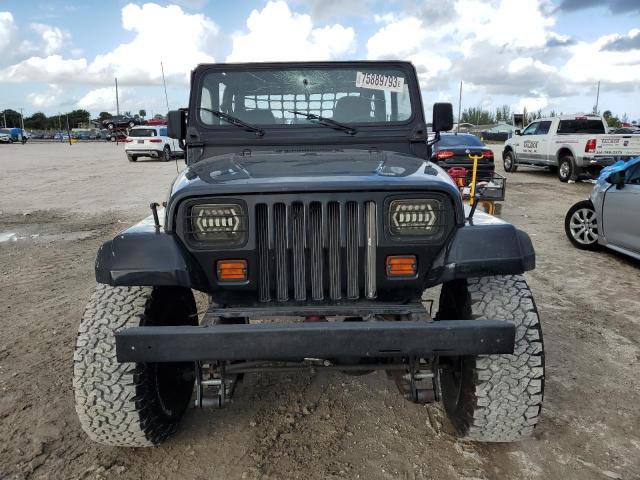 Photo 4 VIN: 1J4FY19P2RP438896 - JEEP WRANGLER 