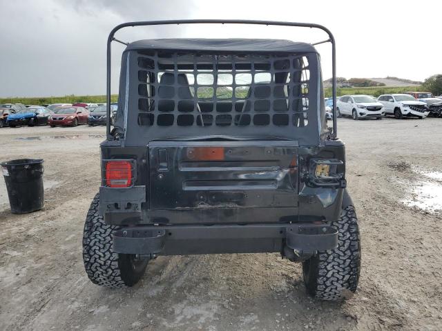 Photo 5 VIN: 1J4FY19P2RP438896 - JEEP WRANGLER 