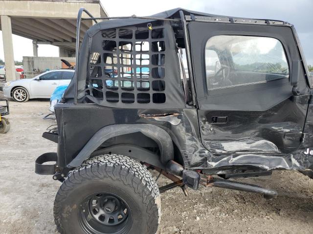 Photo 9 VIN: 1J4FY19P2RP438896 - JEEP WRANGLER 