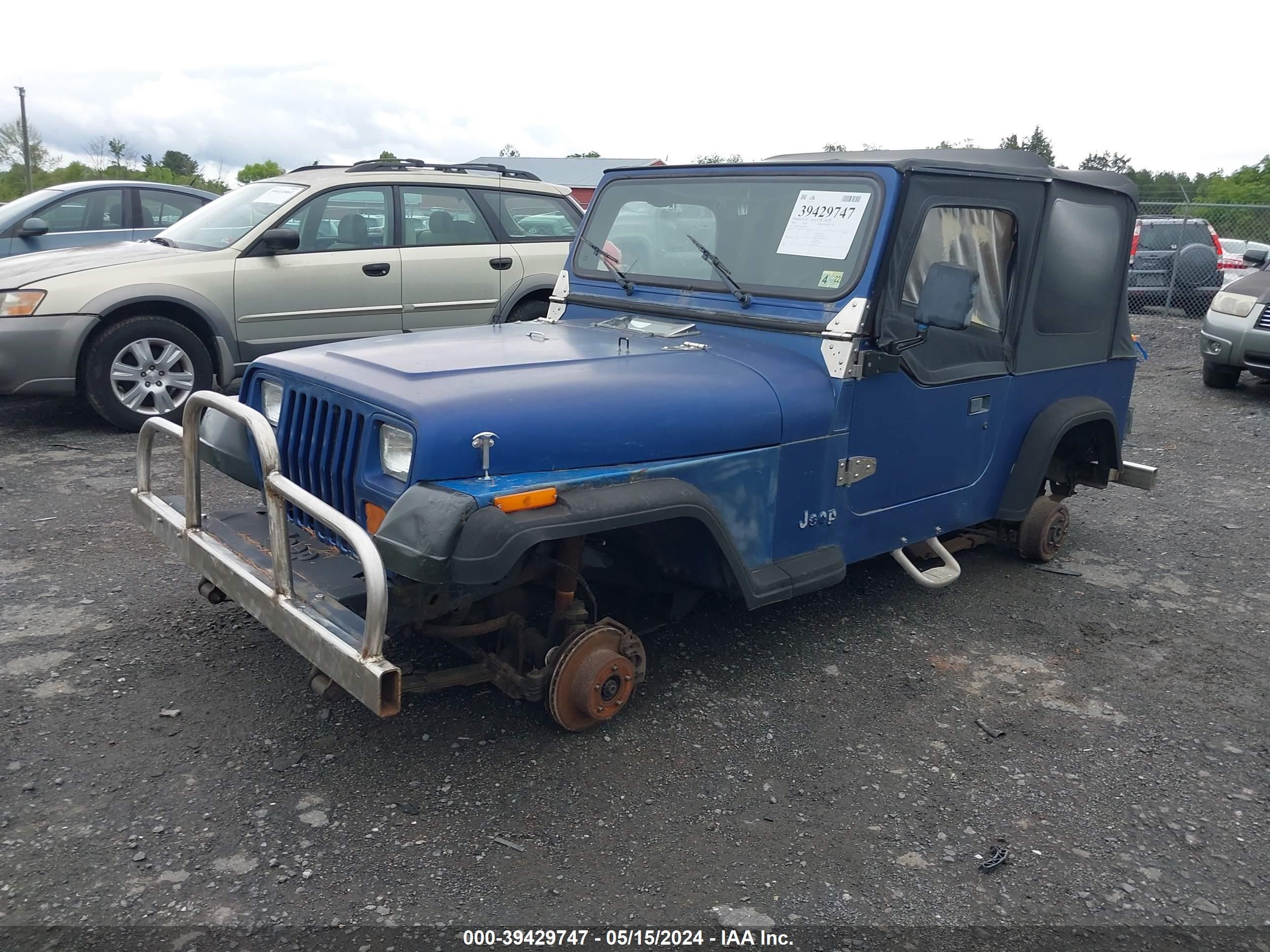 Photo 1 VIN: 1J4FY19P5RP432977 - JEEP WRANGLER 