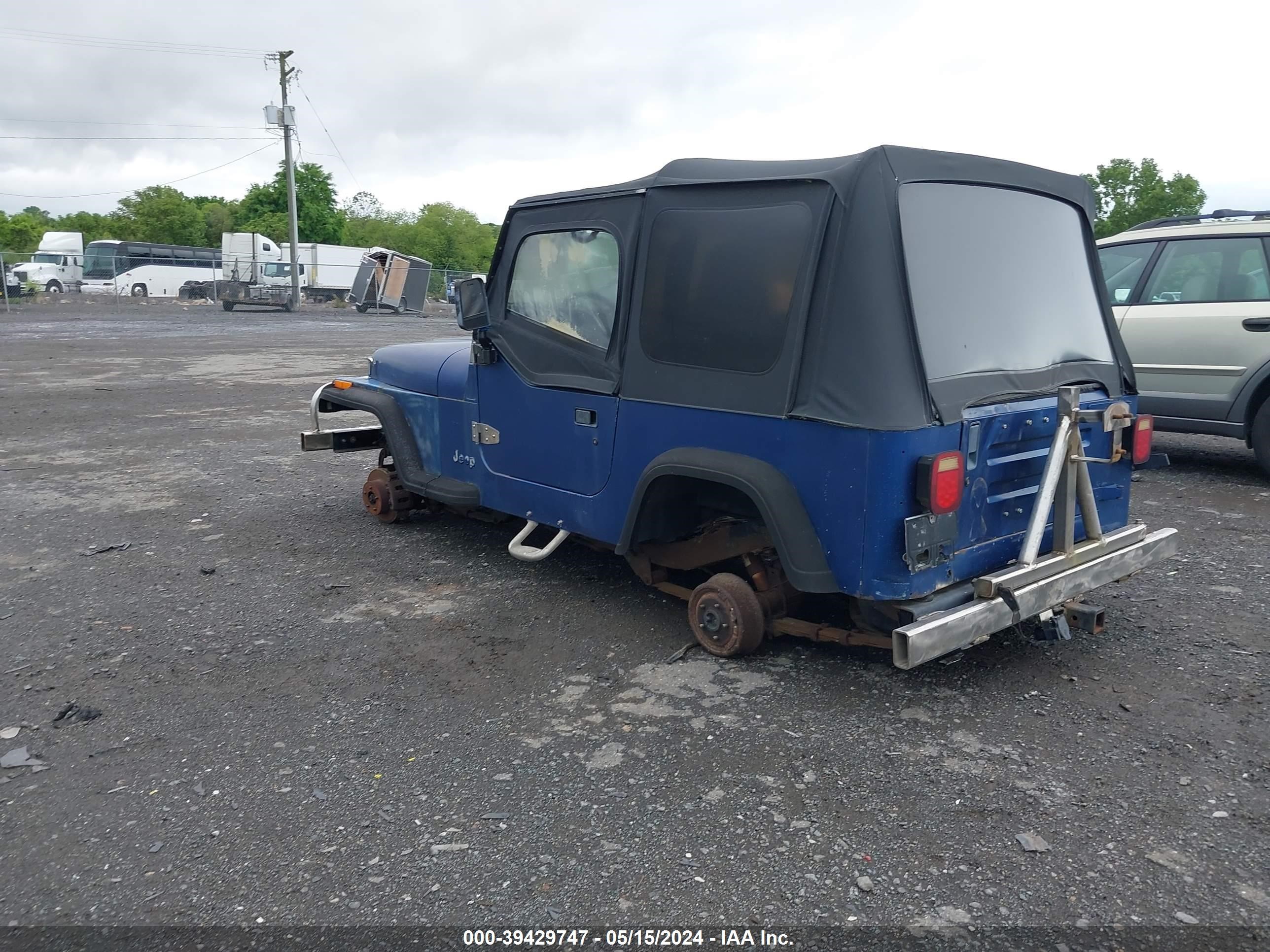 Photo 2 VIN: 1J4FY19P5RP432977 - JEEP WRANGLER 