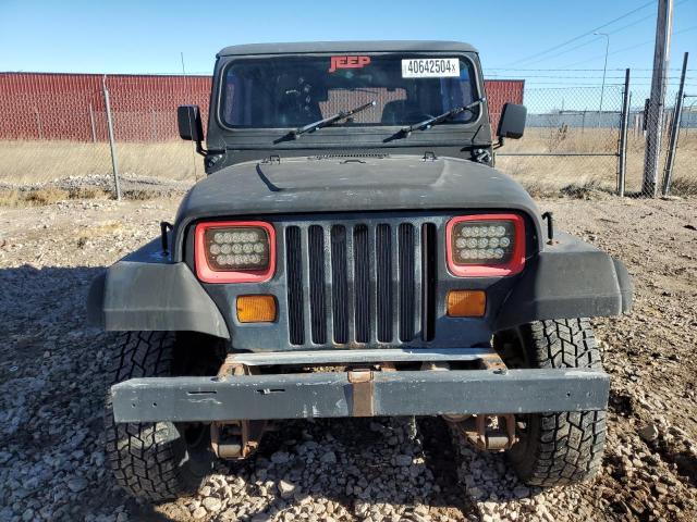 Photo 4 VIN: 1J4FY19P6RP425410 - JEEP WRANGLER 