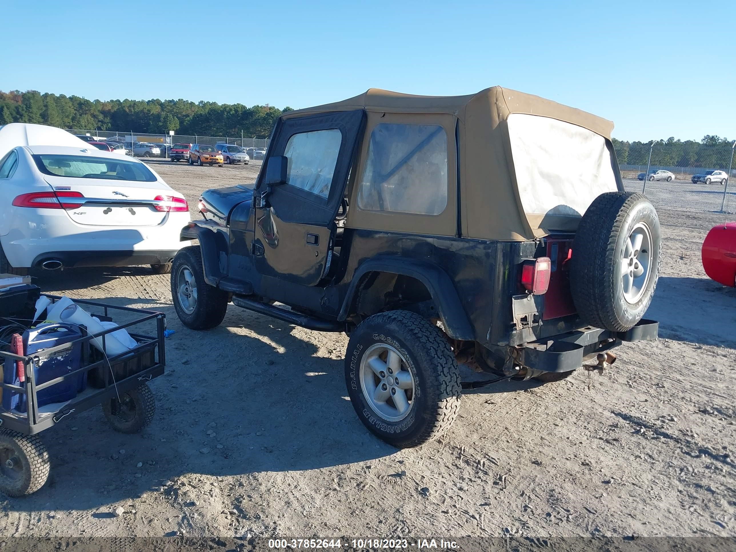 Photo 2 VIN: 1J4FY19P8SP316050 - JEEP WRANGLER 