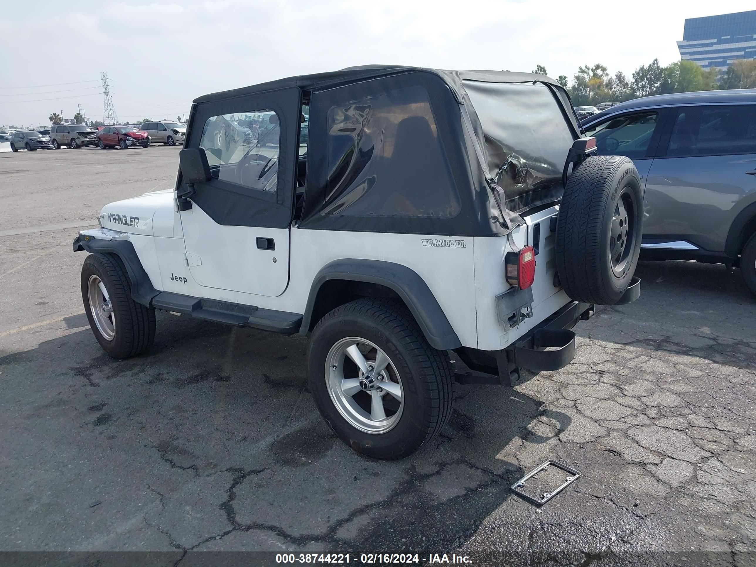 Photo 2 VIN: 1J4FY19P9RP401019 - JEEP WRANGLER 