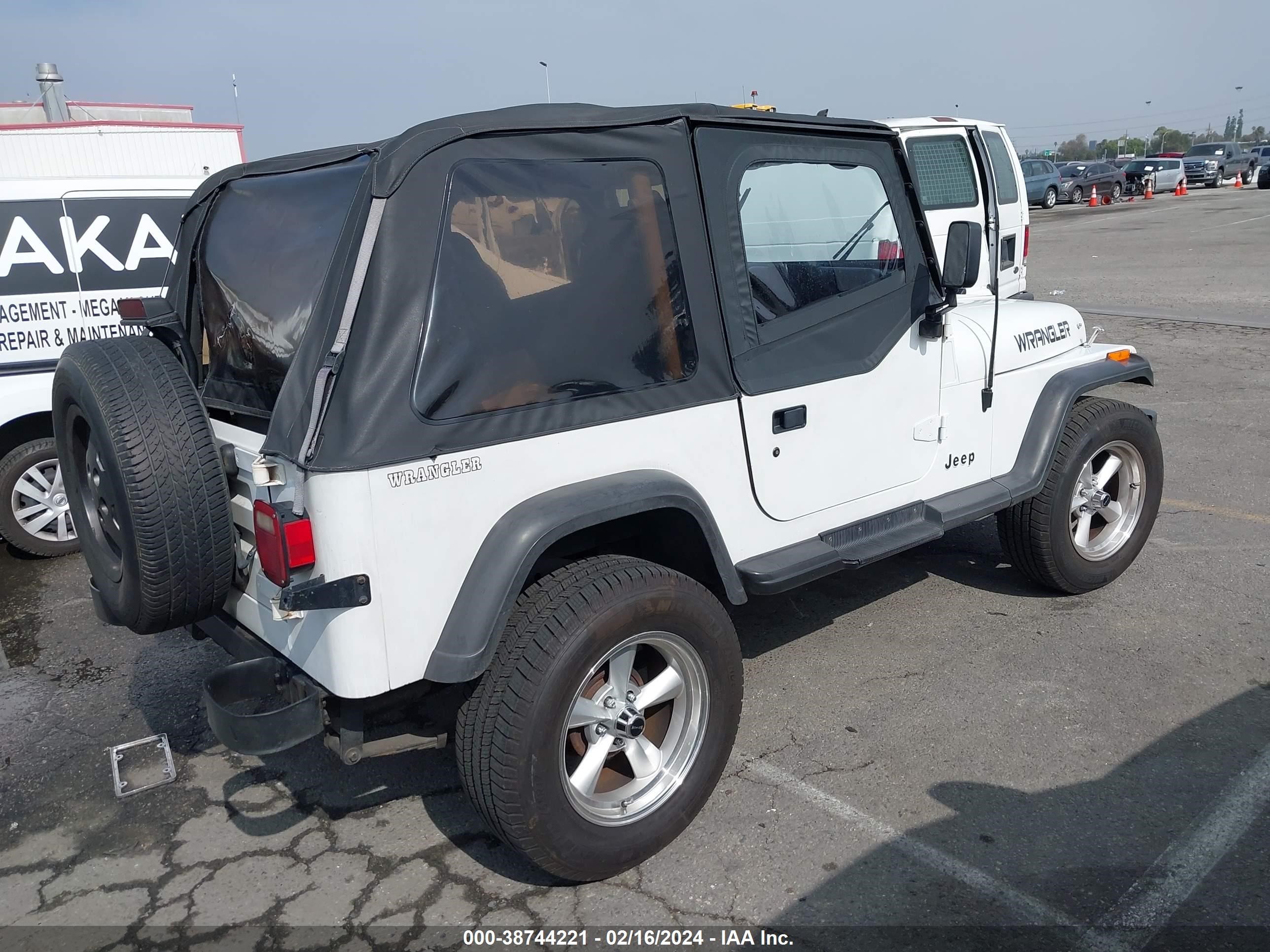 Photo 3 VIN: 1J4FY19P9RP401019 - JEEP WRANGLER 