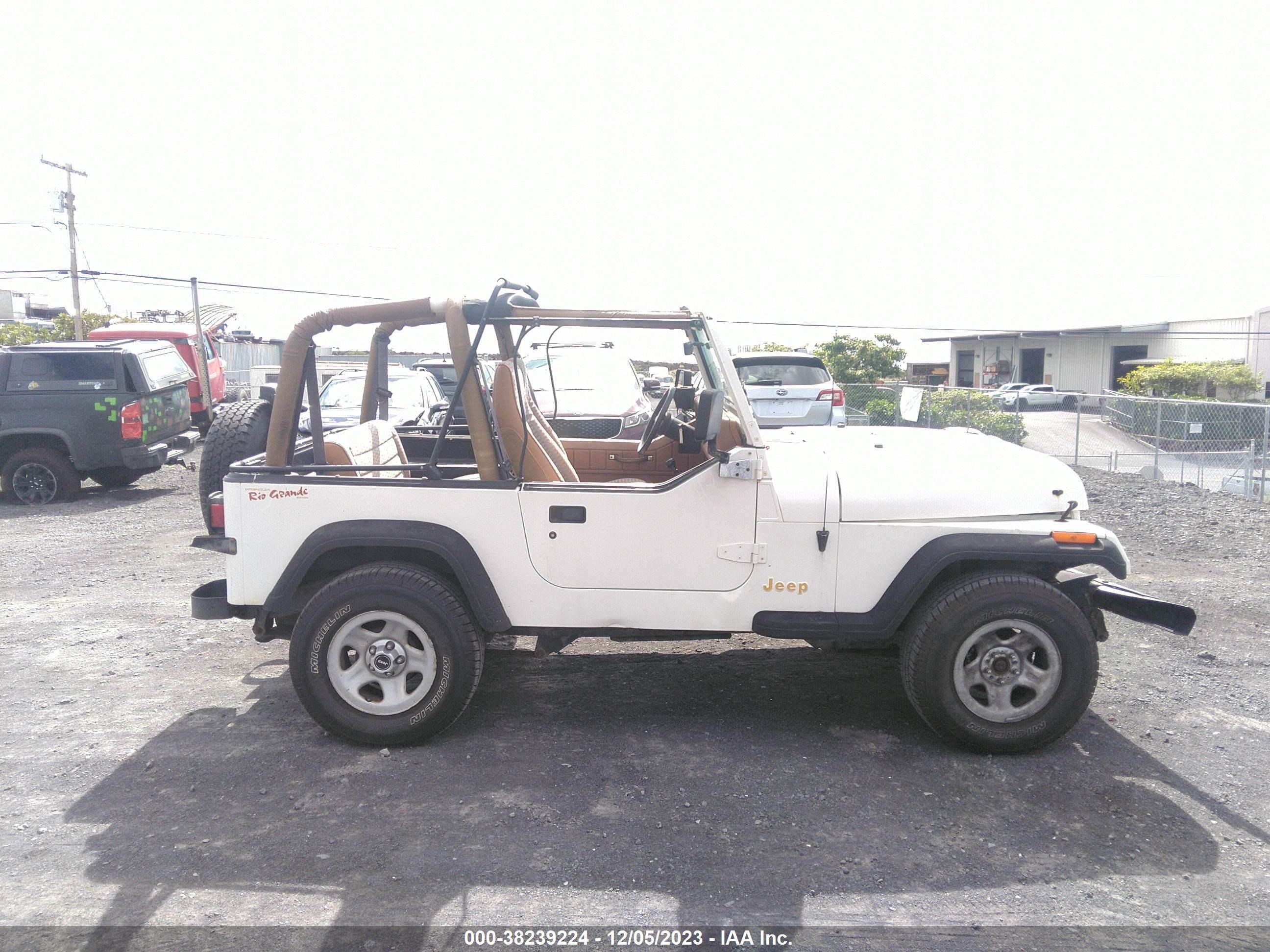 Photo 12 VIN: 1J4FY19P9SP291580 - JEEP WRANGLER 