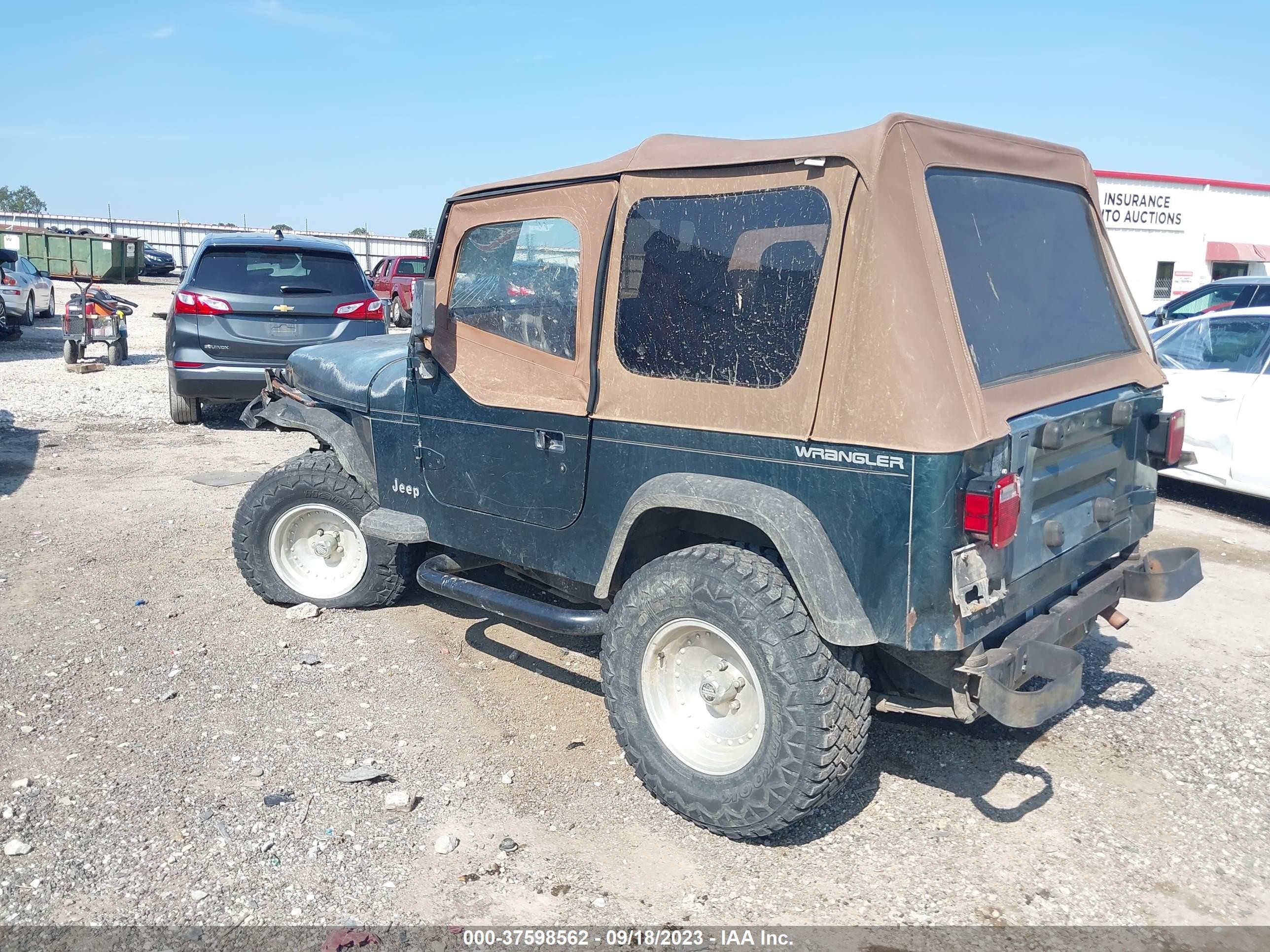 Photo 2 VIN: 1J4FY19PXRP456823 - JEEP WRANGLER 