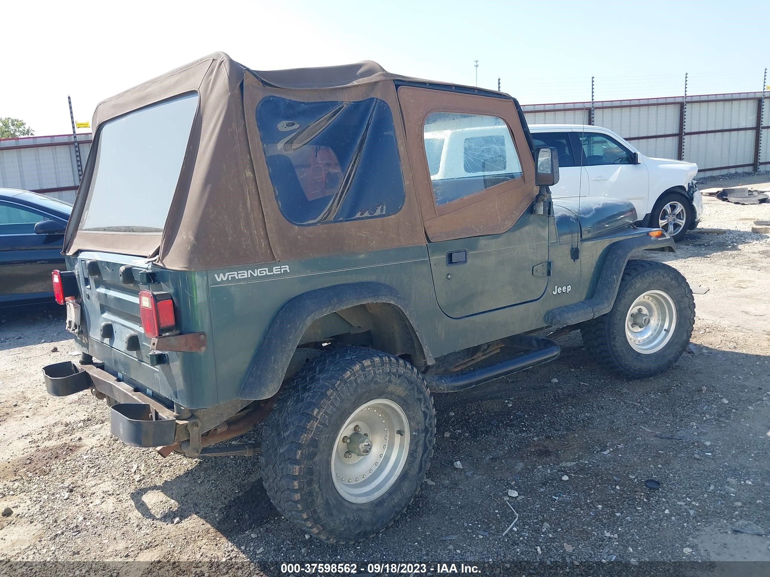 Photo 3 VIN: 1J4FY19PXRP456823 - JEEP WRANGLER 