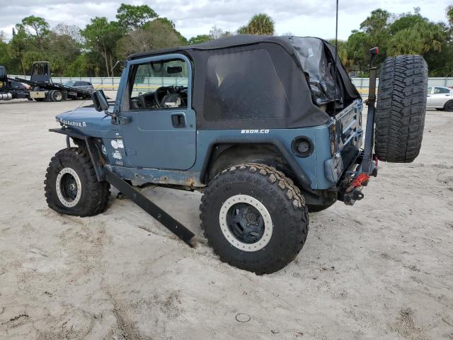 Photo 1 VIN: 1J4FY19S0XP439238 - JEEP WRANGLER 