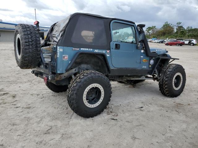 Photo 2 VIN: 1J4FY19S0XP439238 - JEEP WRANGLER 