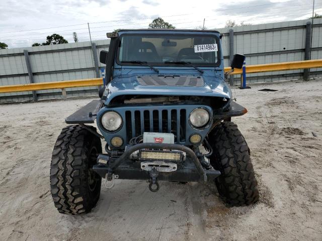 Photo 4 VIN: 1J4FY19S0XP439238 - JEEP WRANGLER 