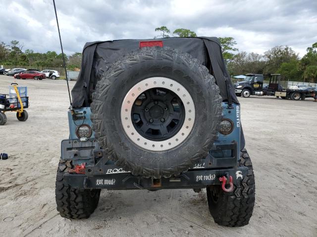 Photo 5 VIN: 1J4FY19S0XP439238 - JEEP WRANGLER 