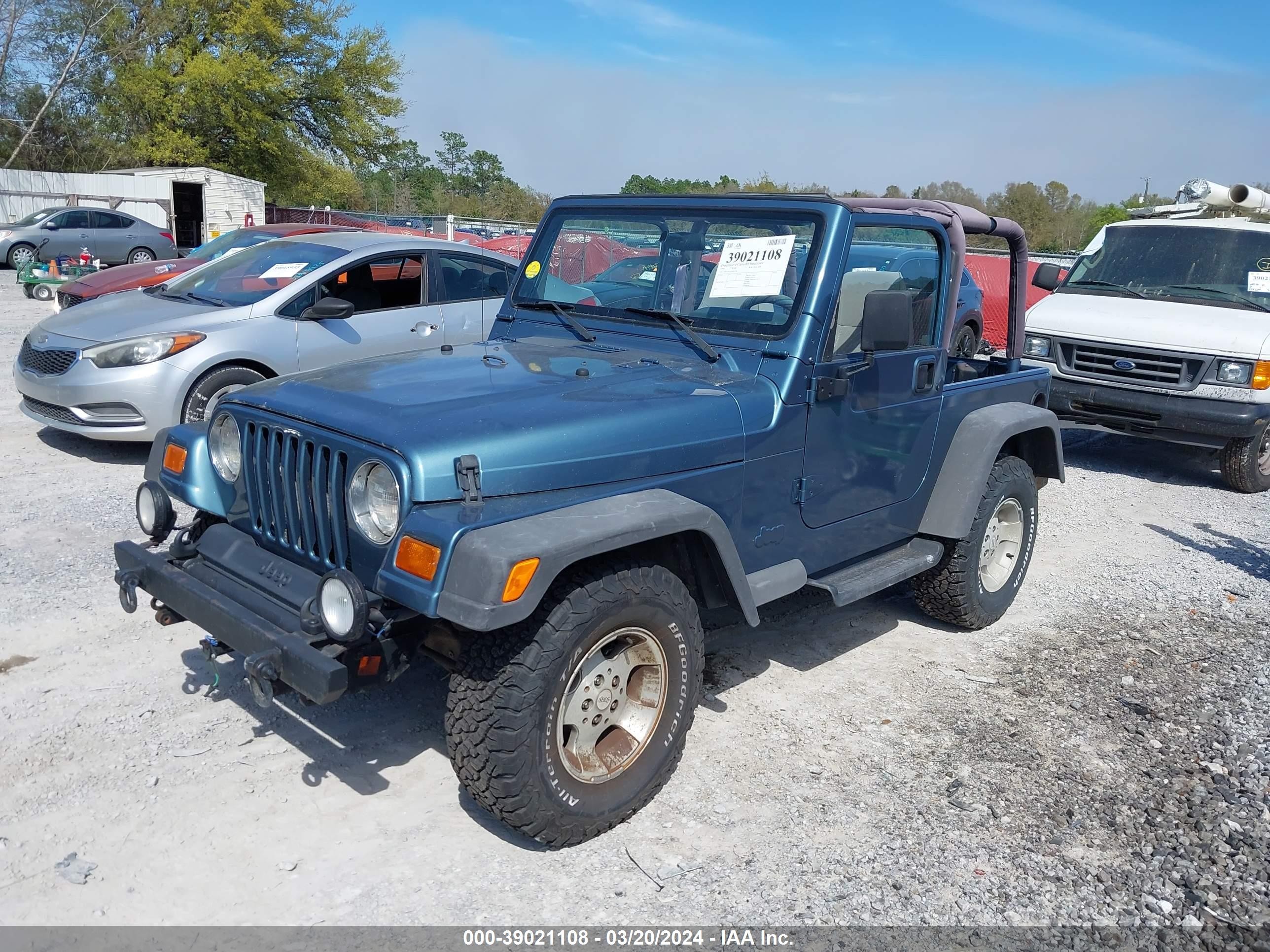 Photo 1 VIN: 1J4FY19S2XP494158 - JEEP WRANGLER 