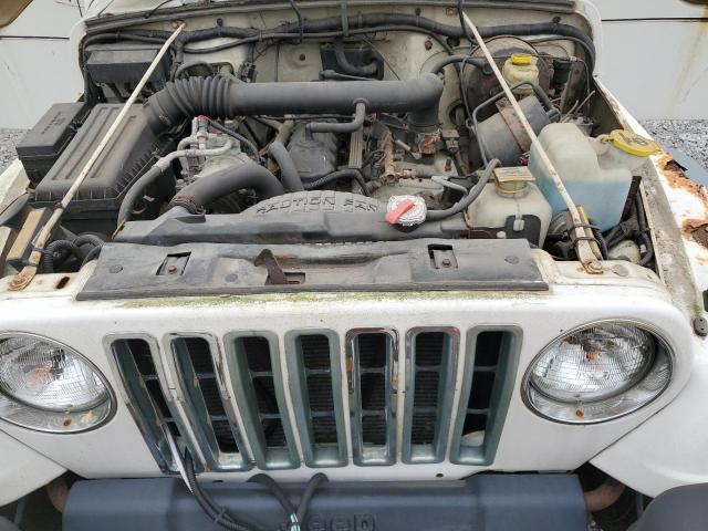 Photo 10 VIN: 1J4FY19S3VP430224 - JEEP WRANGLER 