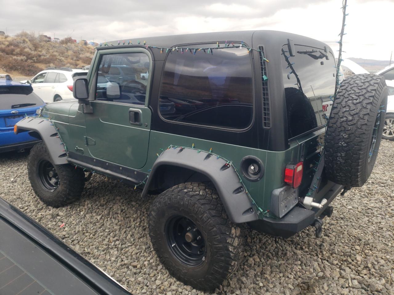 Photo 1 VIN: 1J4FY19S3XP462979 - JEEP WRANGLER 