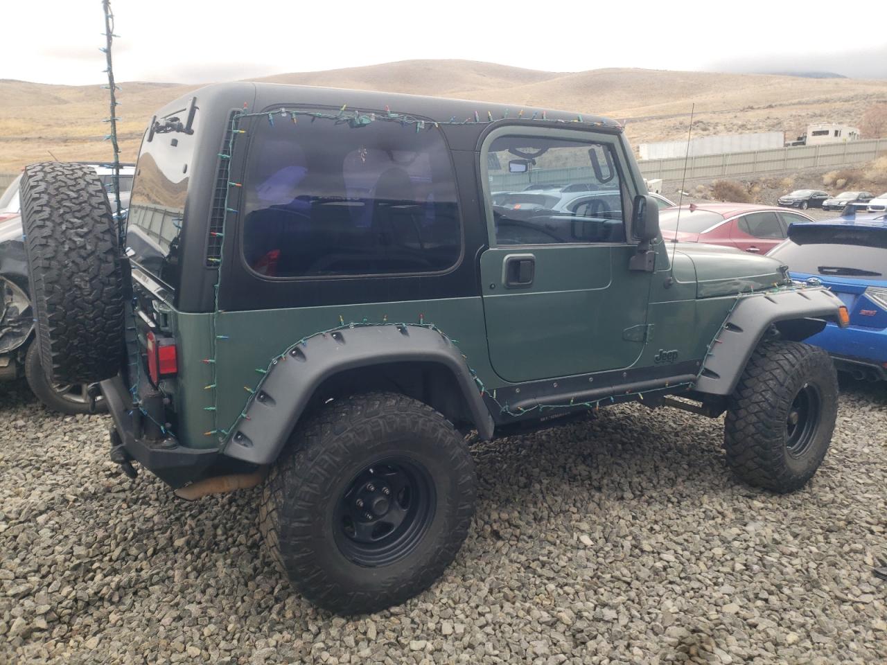 Photo 2 VIN: 1J4FY19S3XP462979 - JEEP WRANGLER 