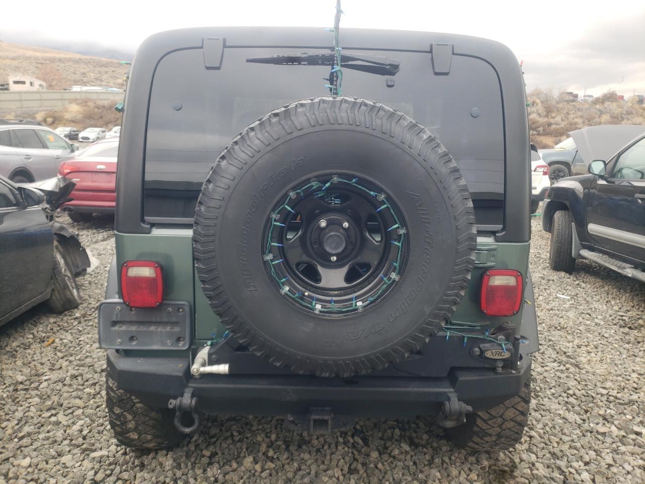 Photo 9 VIN: 1J4FY19S3XP462979 - JEEP WRANGLER 