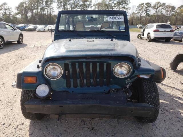 Photo 4 VIN: 1J4FY19S4VP509272 - JEEP WRANGLER 