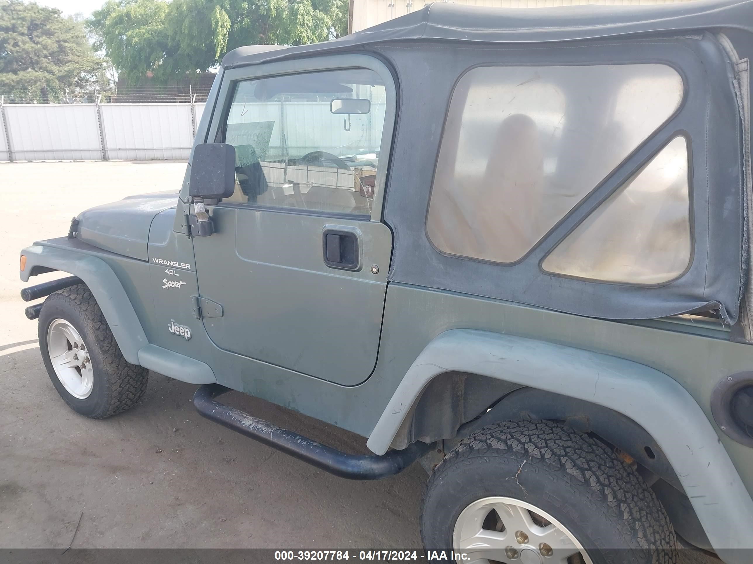 Photo 11 VIN: 1J4FY19S4XP424838 - JEEP WRANGLER 