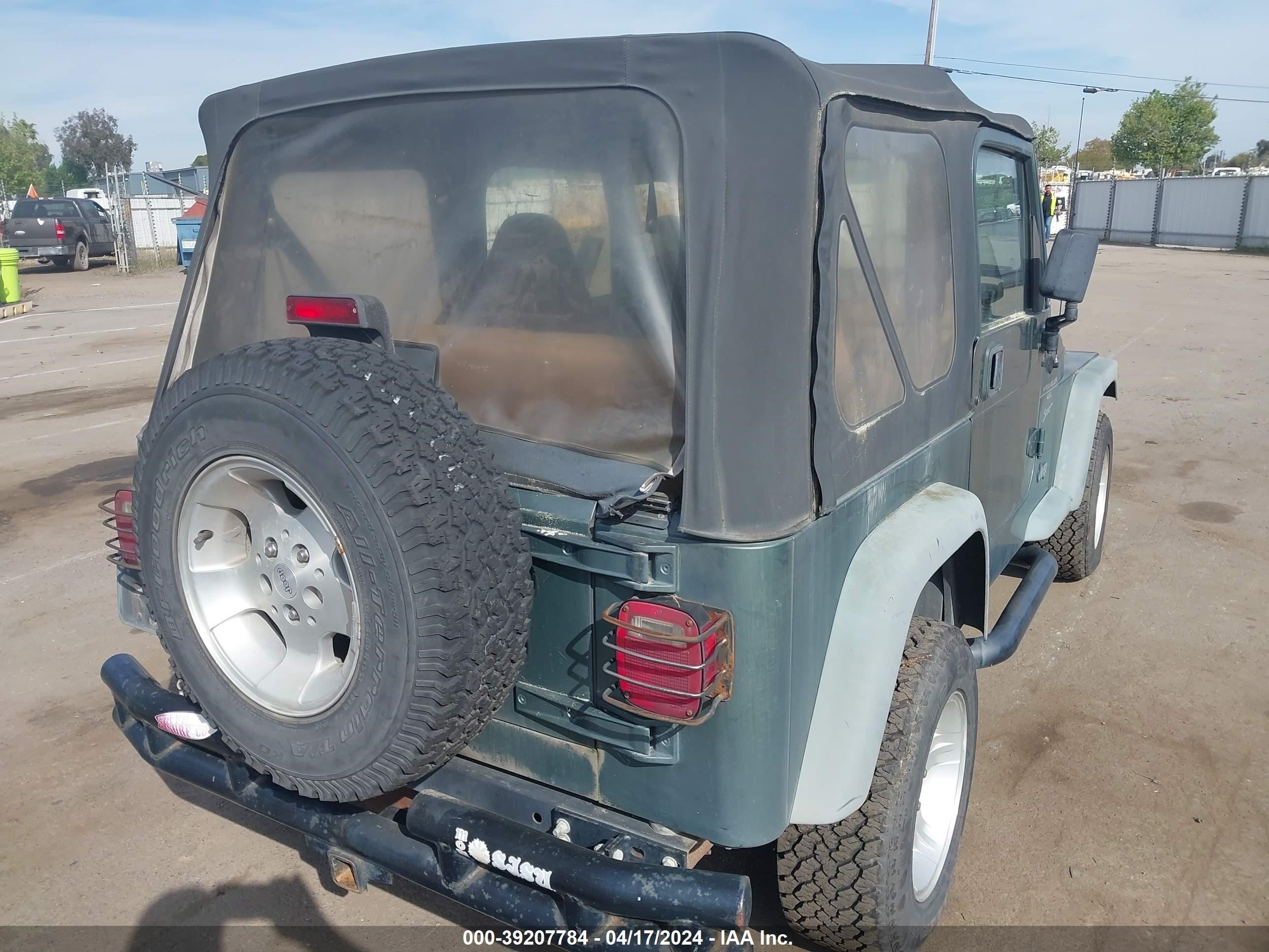 Photo 15 VIN: 1J4FY19S4XP424838 - JEEP WRANGLER 