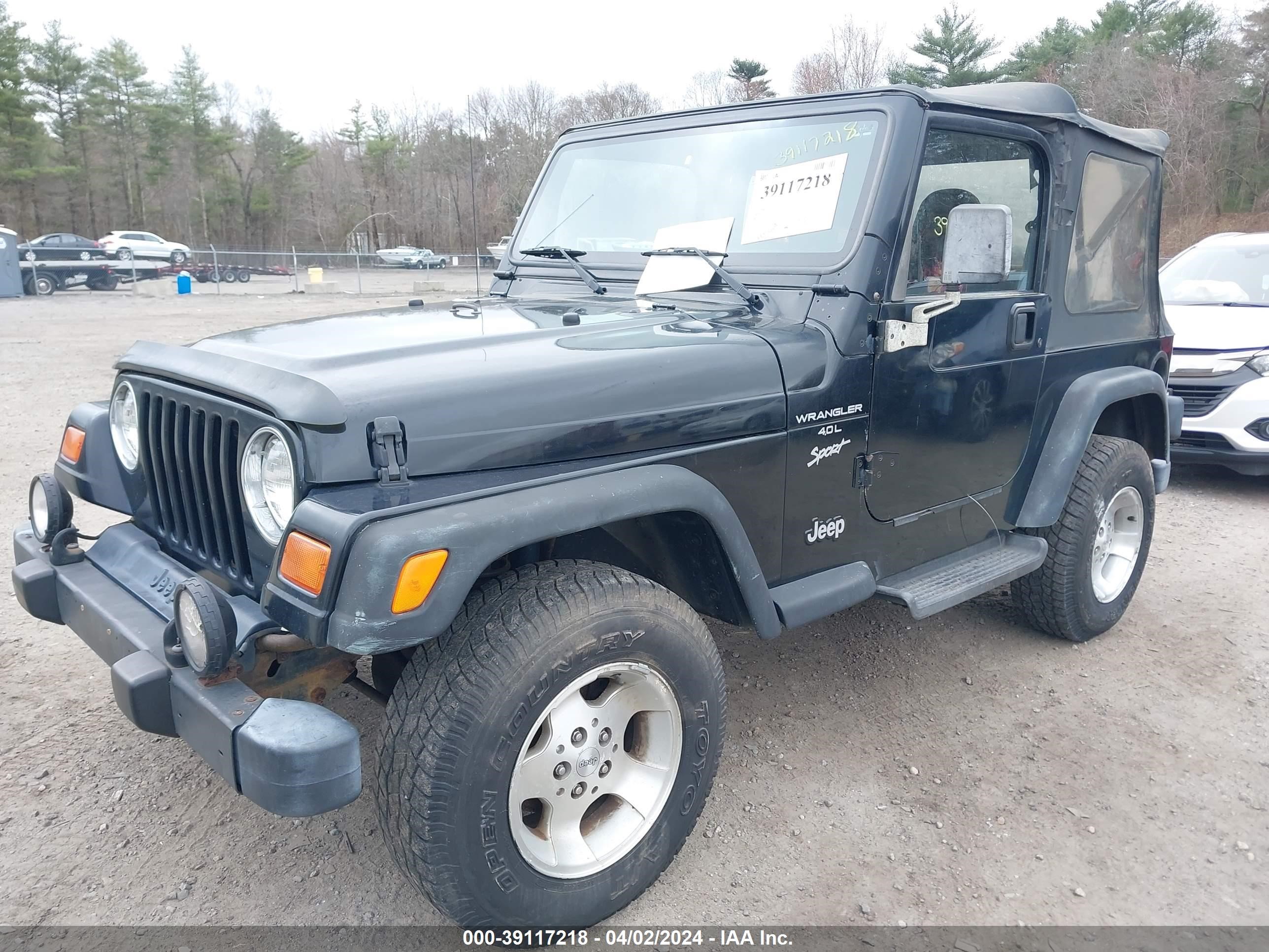 Photo 1 VIN: 1J4FY19S4XP491889 - JEEP WRANGLER 