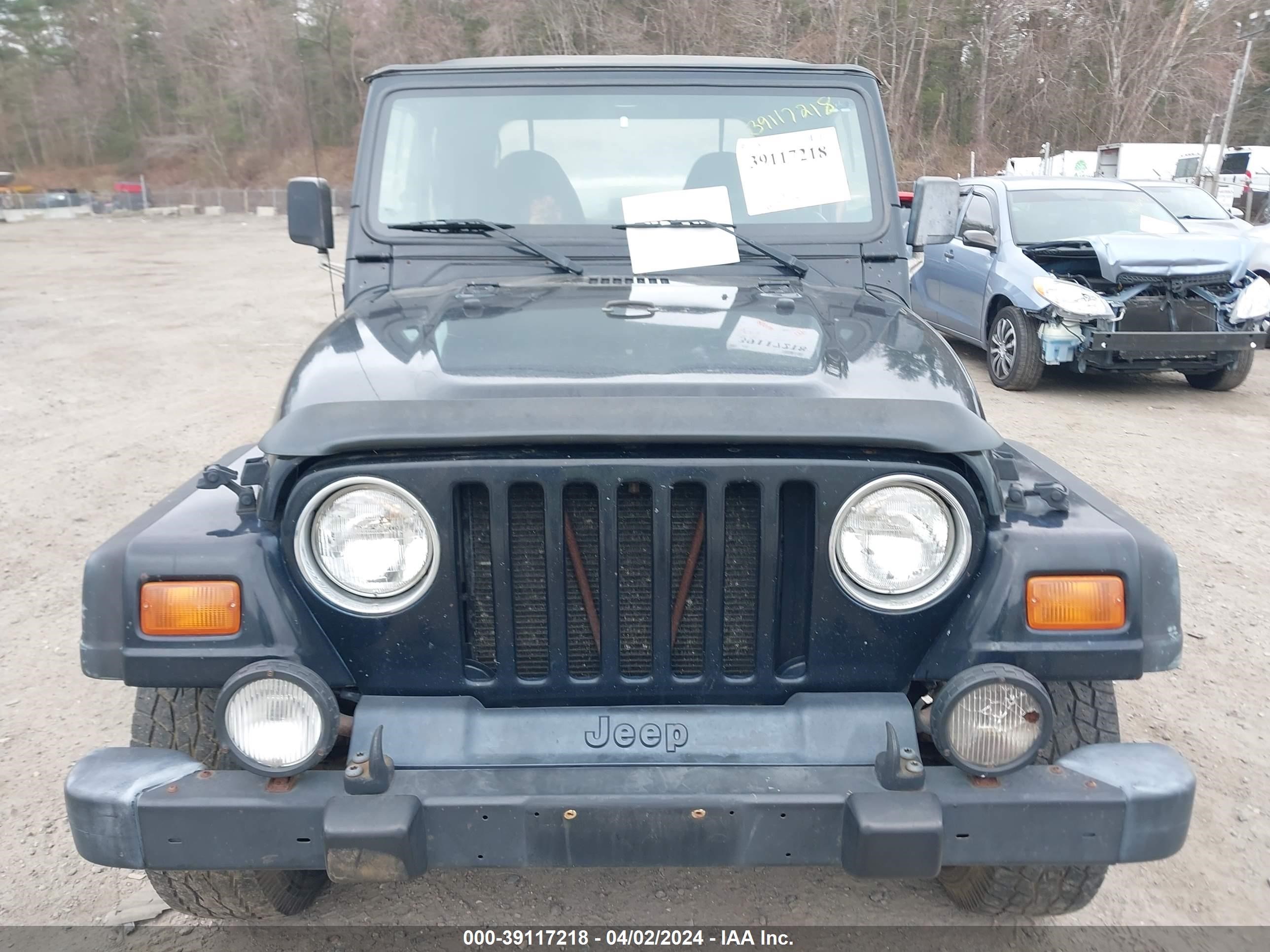 Photo 5 VIN: 1J4FY19S4XP491889 - JEEP WRANGLER 