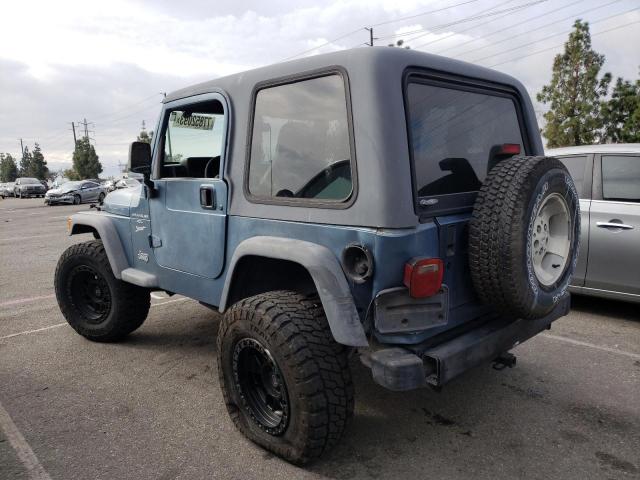 Photo 1 VIN: 1J4FY19S5XP447772 - JEEP WRANGLER 