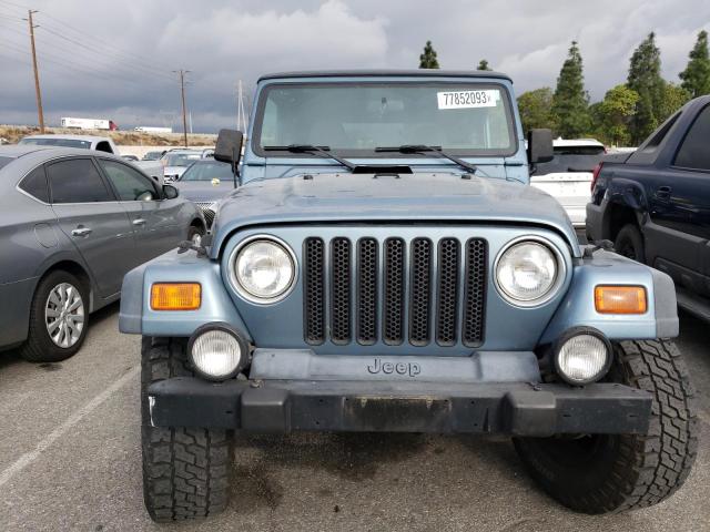 Photo 4 VIN: 1J4FY19S5XP447772 - JEEP WRANGLER 