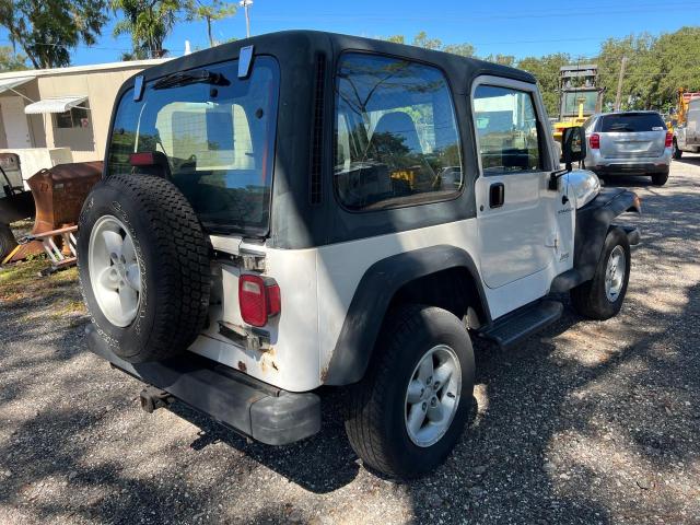 Photo 3 VIN: 1J4FY19S5XP454432 - JEEP WRANGLER 