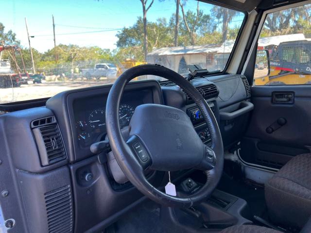 Photo 5 VIN: 1J4FY19S5XP454432 - JEEP WRANGLER 