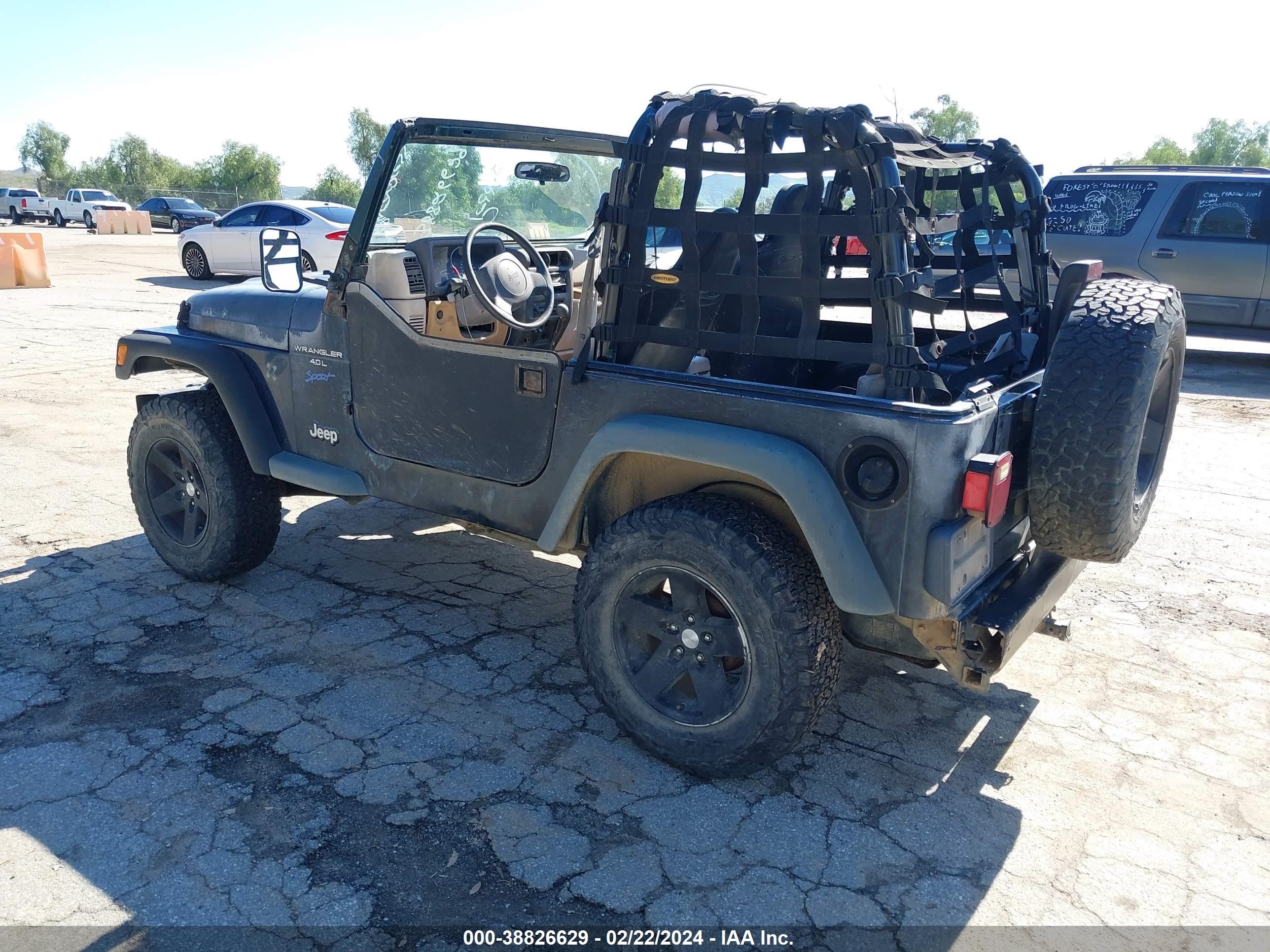 Photo 2 VIN: 1J4FY19S6VP476341 - JEEP WRANGLER 