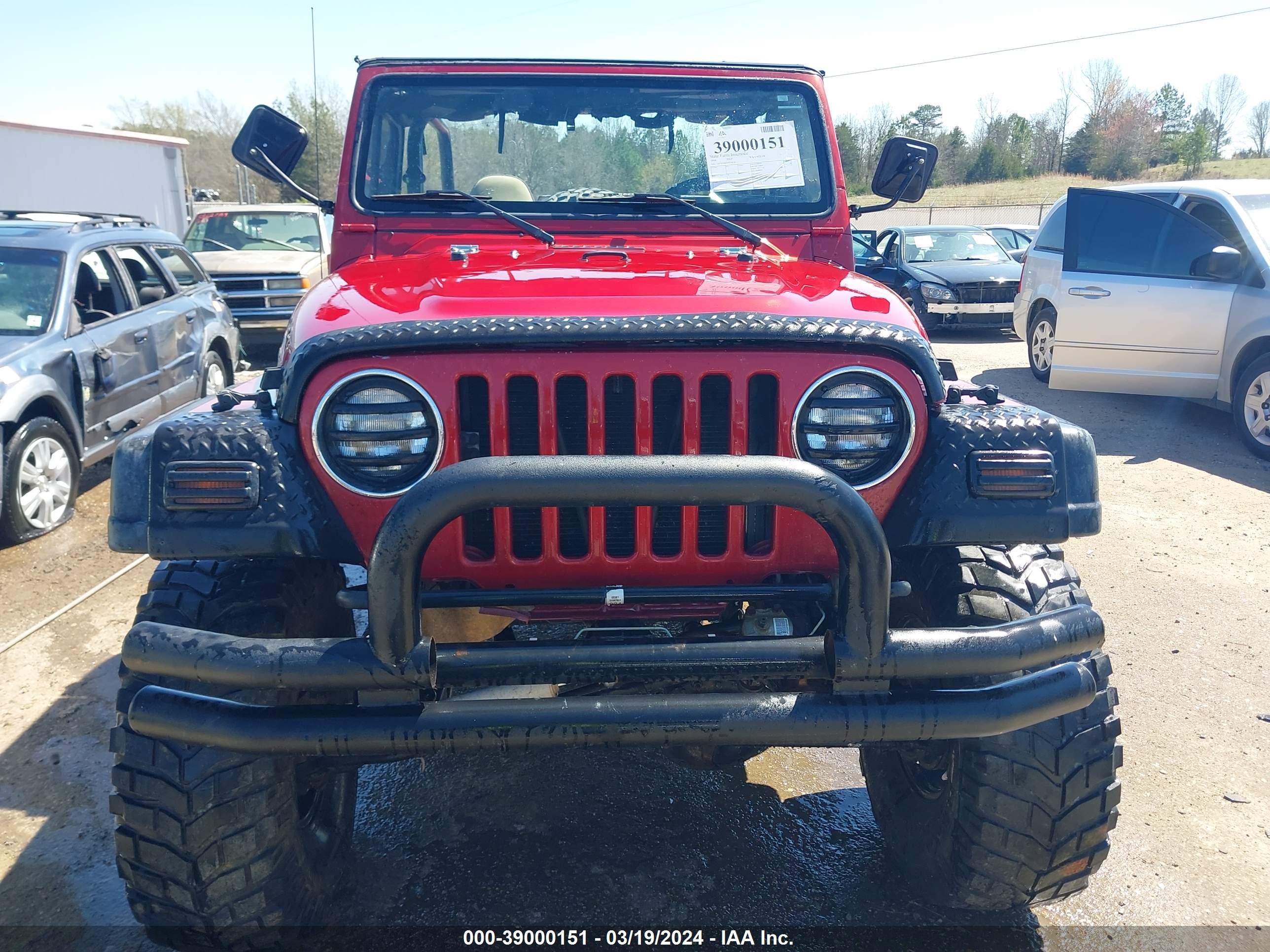 Photo 11 VIN: 1J4FY19S6WP774518 - JEEP WRANGLER 