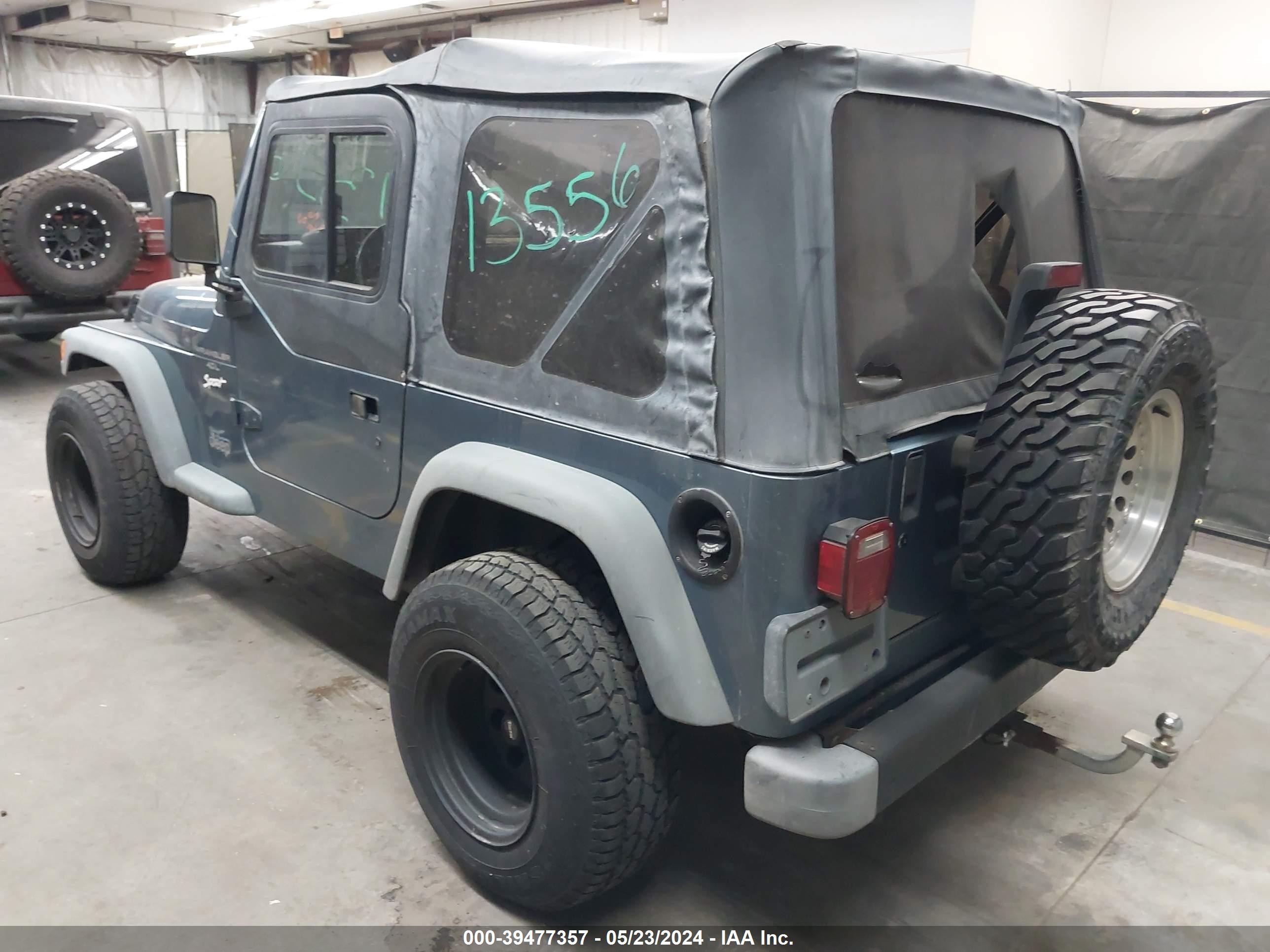 Photo 2 VIN: 1J4FY19S7WP801788 - JEEP WRANGLER 