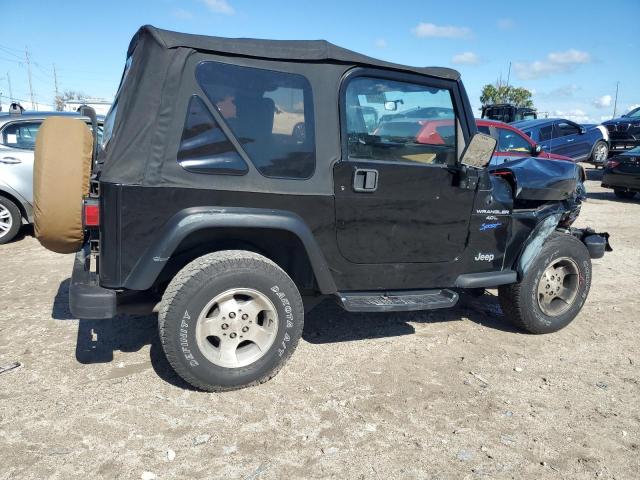 Photo 2 VIN: 1J4FY19S8WP737597 - JEEP WRANGLER 2 