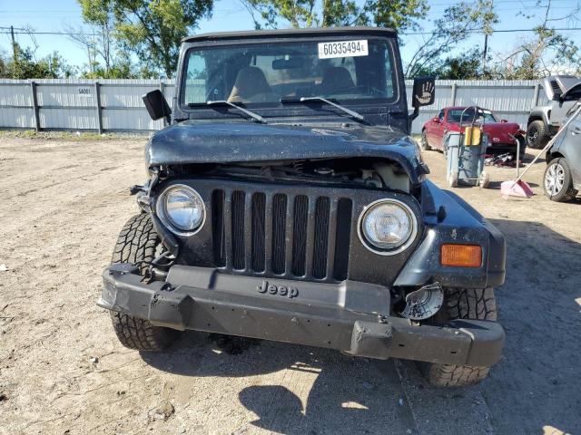 Photo 4 VIN: 1J4FY19S8WP737597 - JEEP WRANGLER 2 