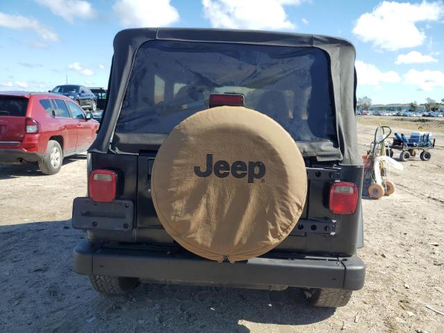 Photo 5 VIN: 1J4FY19S8WP737597 - JEEP WRANGLER 2 