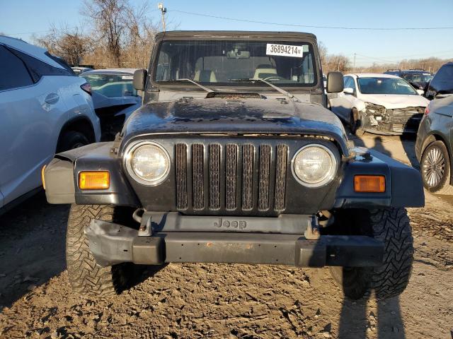 Photo 4 VIN: 1J4FY19SXWP709087 - JEEP WRANGLER 