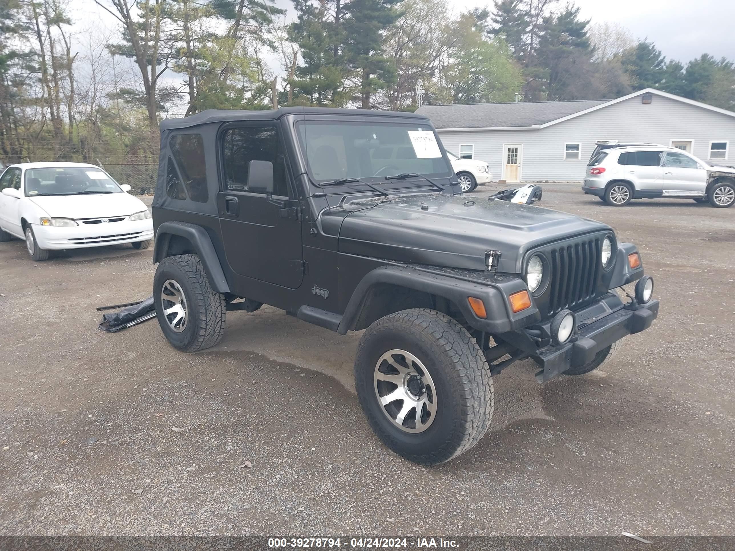 Photo 1 VIN: 1J4FY19SXWP711941 - JEEP WRANGLER 