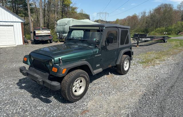 Photo 1 VIN: 1J4FY29P0XP403907 - JEEP WRANGLER 