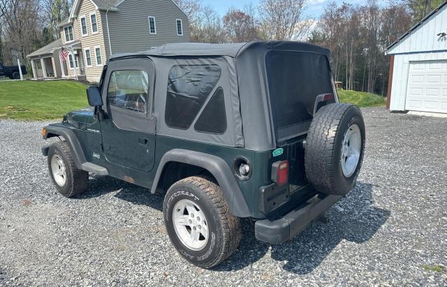 Photo 2 VIN: 1J4FY29P0XP403907 - JEEP WRANGLER 