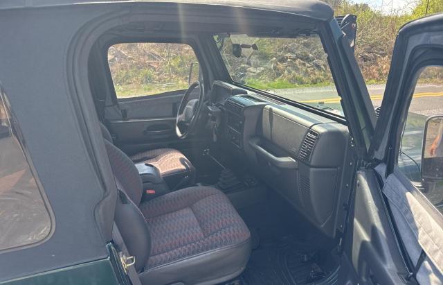 Photo 4 VIN: 1J4FY29P0XP403907 - JEEP WRANGLER 