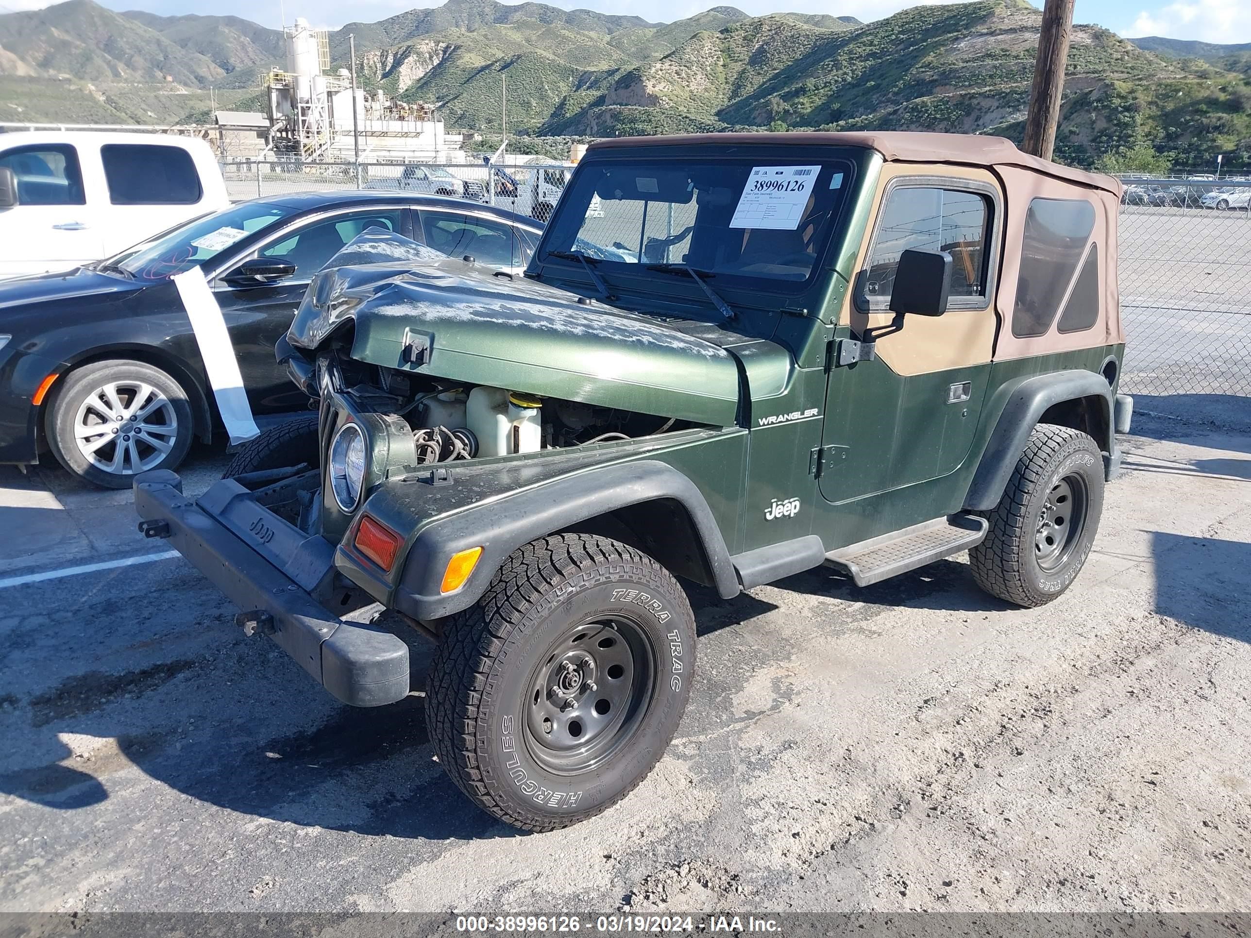 Photo 1 VIN: 1J4FY29P1VP424004 - JEEP WRANGLER 