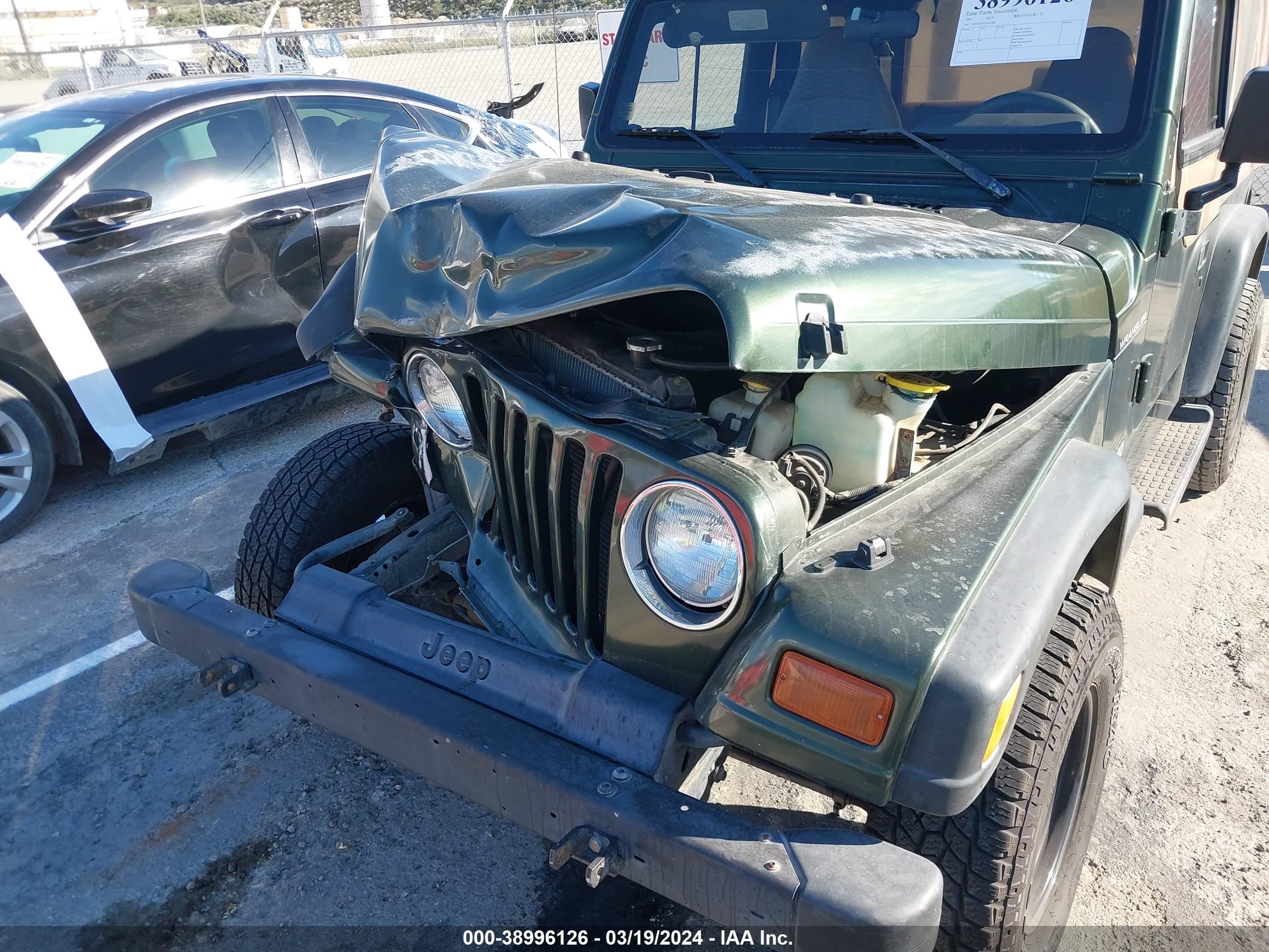 Photo 16 VIN: 1J4FY29P1VP424004 - JEEP WRANGLER 