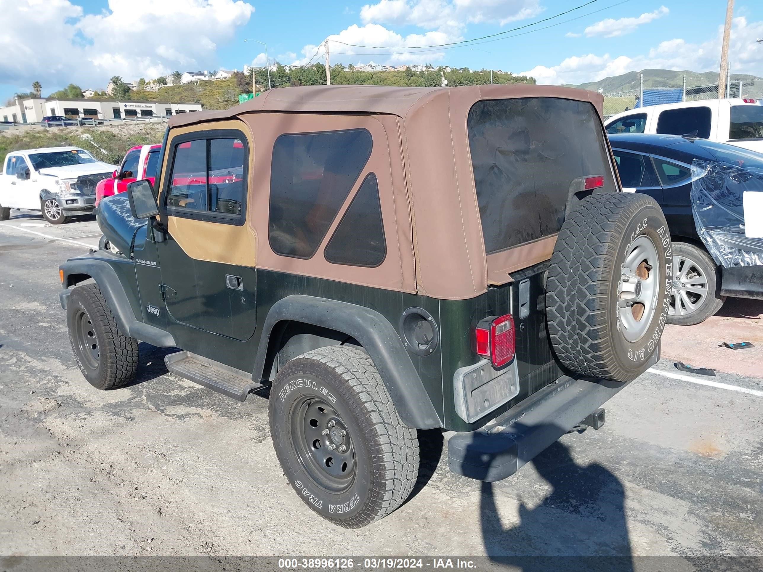 Photo 2 VIN: 1J4FY29P1VP424004 - JEEP WRANGLER 